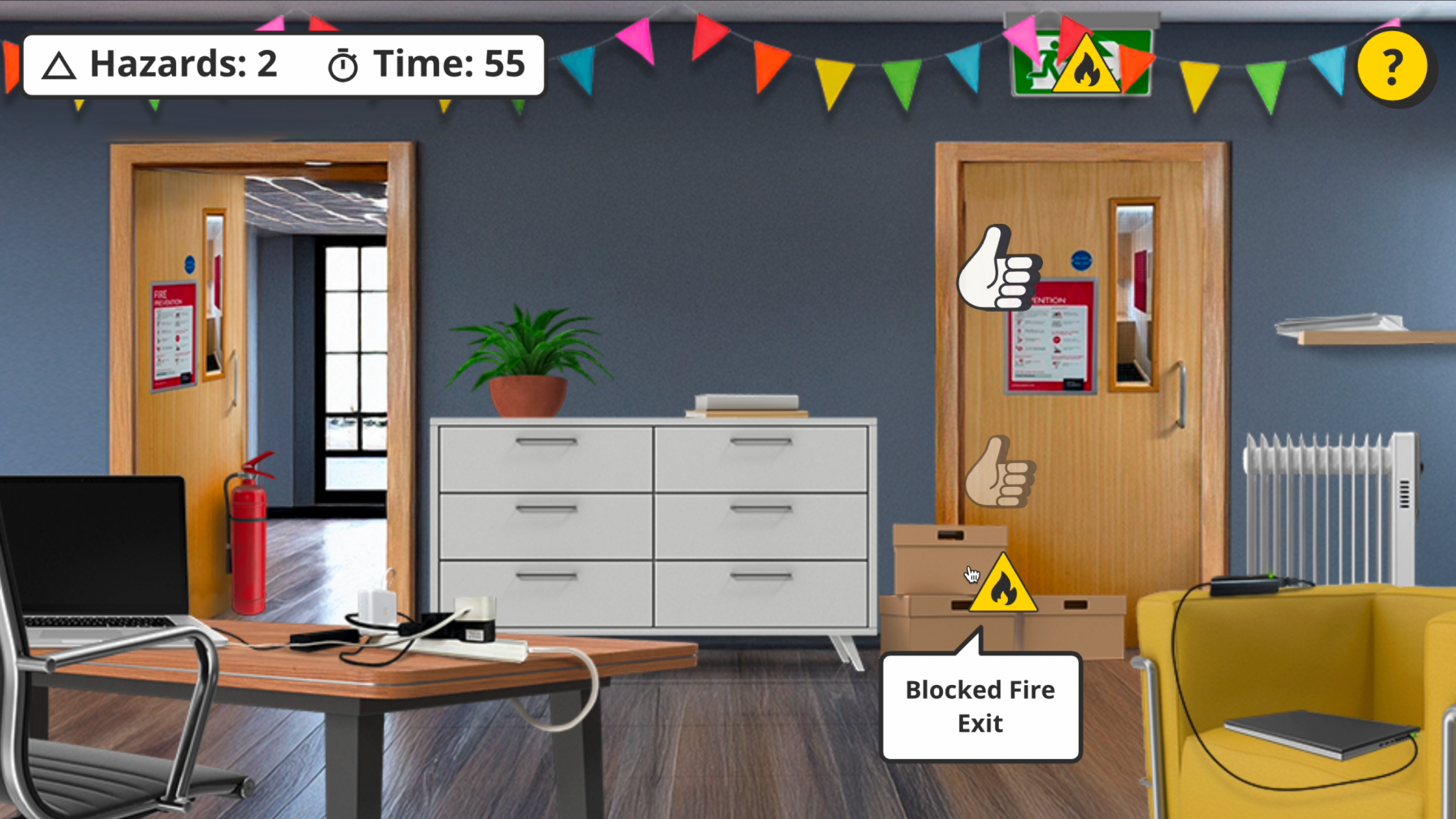 Screenshot of a fire hazard spotting game, set in an office.